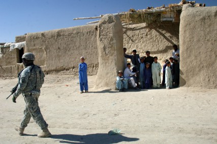 U.S Army Sgt. 1st Class David Banks, from Alpha Company, 2nd Battalion, 508th Parachute Infantry Regiment, moves through Pana, Afghanistan, during a cordon and search, June 9, 2007. 
