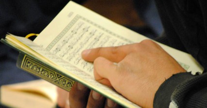 A man practices reciting the Quran 