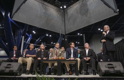 Frank Page, right, president of the Southern Baptist Convention Executive Committee, leads a panel discussion with members of the President?s Council on Calvinism at the Southern Baptists? annual meeting in Houston.  