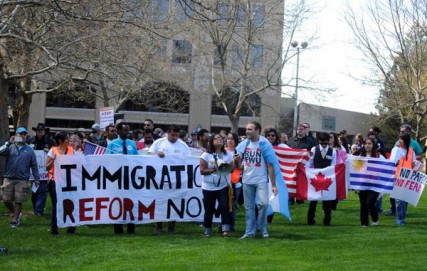 Residents rally for immigration reform on May Day in Spokane. 