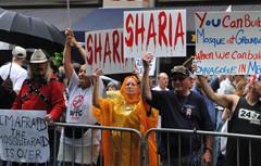 Anti-Shariah demonstrators rally against a proposed mosque near Ground Zero in New York 