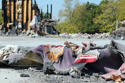 Everything inside the mosque was damaged or destroyed in the August 2012 fire, including these prayer rugs.  