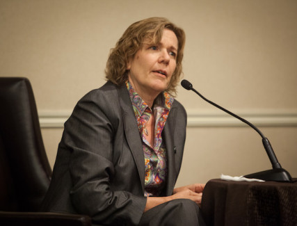 Sara Miles speaks to religion reporters at a recent conference in Austin.