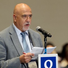 (RNS1-JUNE 19) Rifat Kassis addresses the 221st Presbyterian Church (USA) General Assembly in Detroit, Mich., on June 19. In a 76-24 percent vote, the assembly voted to allow its clergy to perform same-sex unions in states where gay marriage is legal. For use with RNS-PRESBY-GAYS, transmitted June 19, 2014. RNS photo courtesy Michael Whitman via PC(USA)