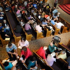 Nearly 200 people gathered for the Spokane Alliance meeting to discuss paid sick leave