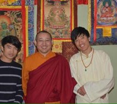 Jigmed Tubtel (left) and Jugmed Dawa (right) stand with Lama Lakshey Zangpo