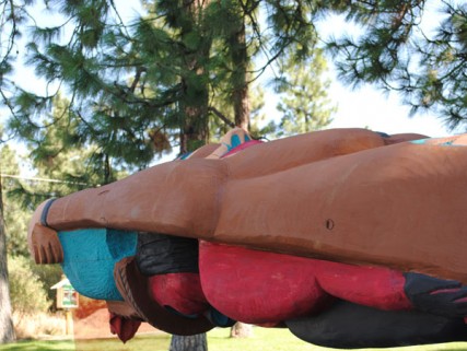 A 19-foot totem pole rests on a flat bed as it makes its way through Spokane/Tracy Simmons - SpokaneFAVS