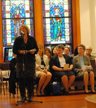 Rabbi Elizabeth Goldstein reads a prayer in Hebrew at an interfaith service at Gonzaga/Tracy Simmons - SpokaneFAVS