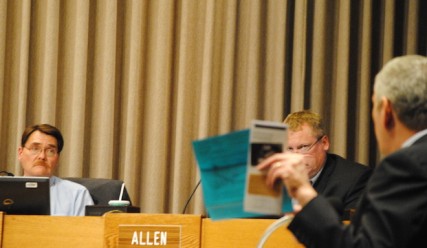 A man shows Sidewalk Advocates for Life brochures at a City Council Meeting on Jan. 15/Tracy Simmons - SpokaneFAVS