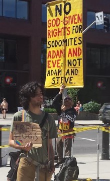 A protestory at Spokane's 2015 Pride Parade/Sarah Taylor - SpokaneFAVS