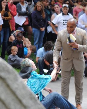 Phillip Tyler of Spokane NAACP speaks with a protestor at a Black Lives Matter vigil in Spokane/Tracy Simmons - SpokaneFAVS