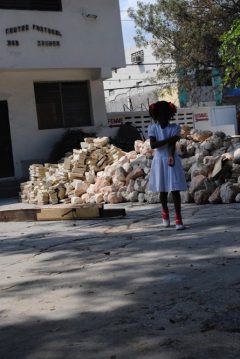 A young girl dressed for Sunday church in Haiti not long after the 2010 earthquake/Tracy Simmons