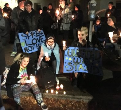 Spokane youth hold signs opposing a Trump Administration/Tracy Simmons - SpokaneFAVS