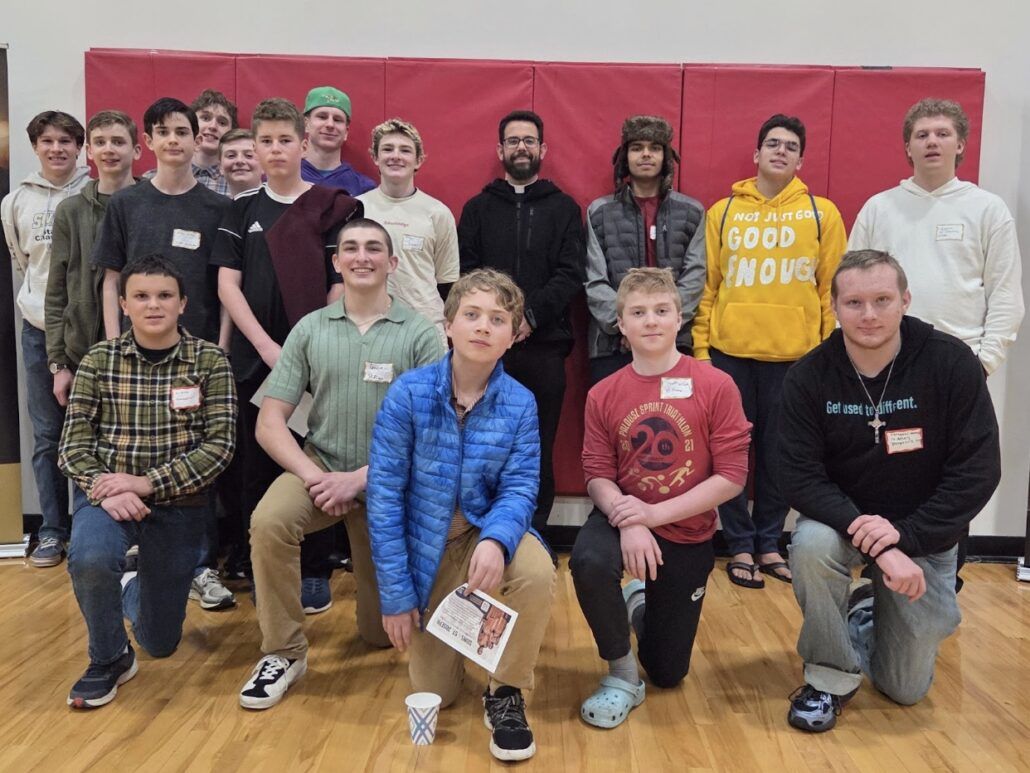 Group of young men posing together
